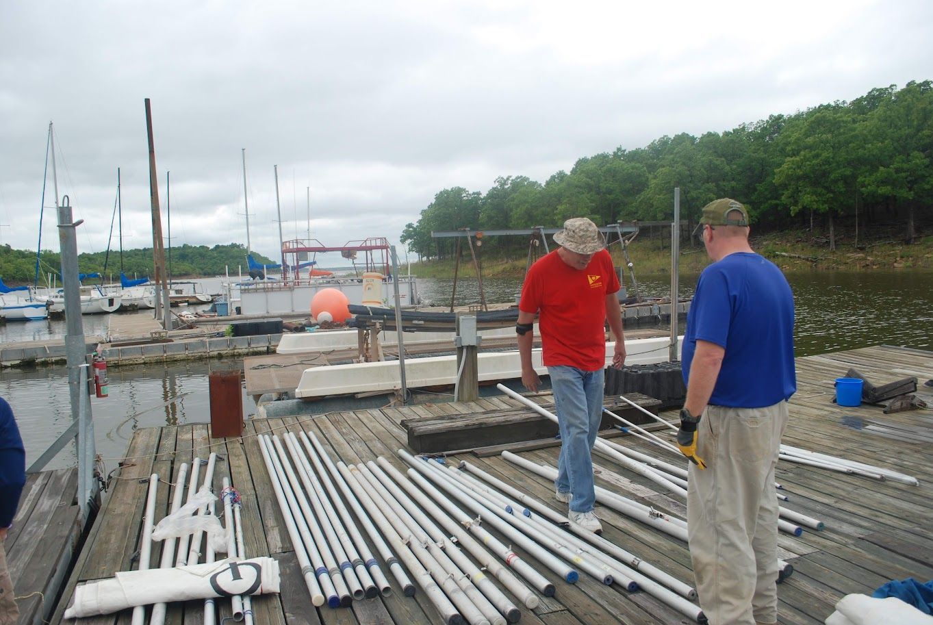 work party, training dock, new planks strewn across the top